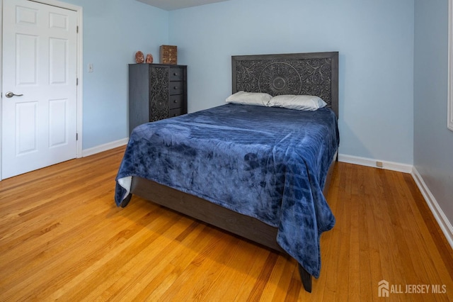 294 Fresh Pond Rd, South Brunswick, NJ 08902 - bedroom with wood finished floors and baseboards