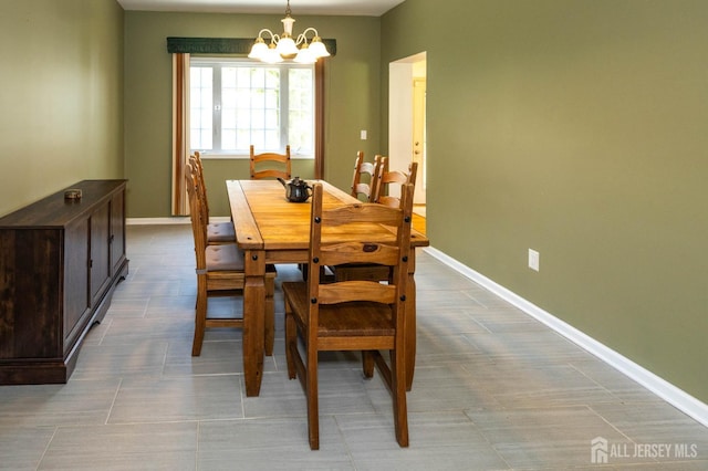 294 Fresh Pond Rd, South Brunswick, NJ 08902 - dining area with a chandelier and baseboards