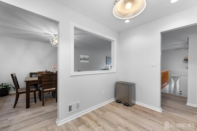 45 Kenmore Rd, Edison, NJ 08817 - hallway featuring wood finished floors, recessed lighting, and an upstairs landing