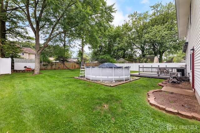 45 Kenmore Rd, Edison, NJ 08817 - fenced backyard with a deck