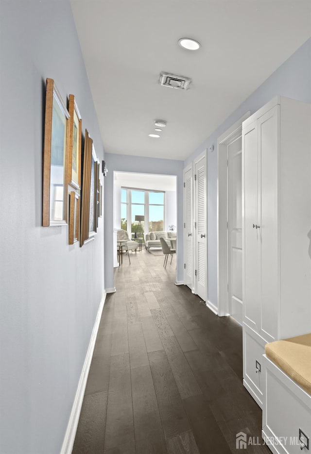 20 Livingston Ave Unit 601, New Brunswick, NJ 08901 - corridor featuring baseboards and dark wood-type flooring