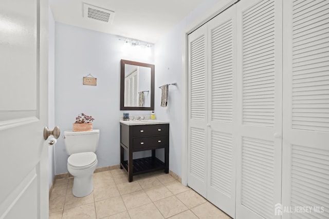 20 Livingston Ave Unit 601, New Brunswick, NJ 08901 - bathroom with a closet, vanity, and tile patterned floors