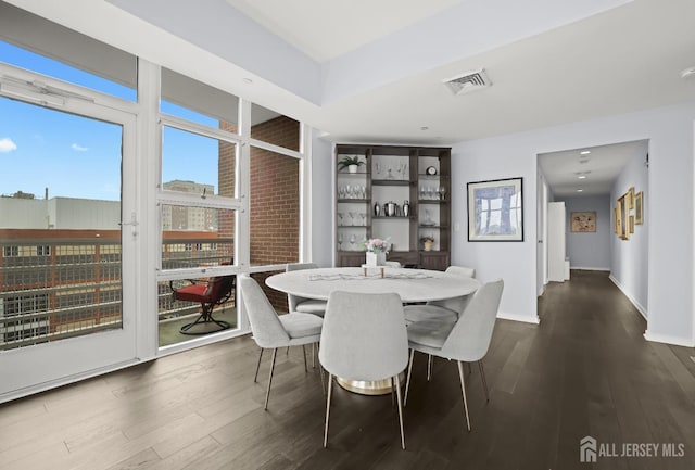 20 Livingston Ave Unit 601, New Brunswick, NJ 08901 - dining area featuring dark wood-style flooring and healthy amount of natural light