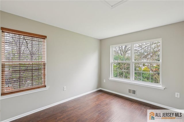 1115 Joseph Ct, South Plainfield, NJ 07080 - unfurnished room featuring baseboards and dark wood-style flooring