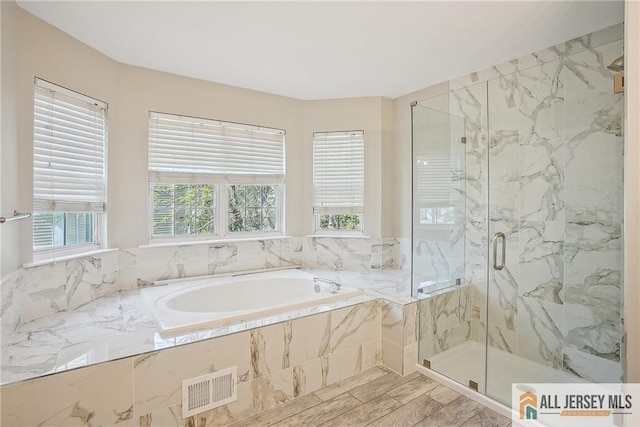 1115 Joseph Ct, South Plainfield, NJ 07080 - full bathroom featuring a marble finish shower and a garden tub