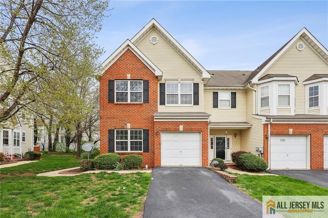 1115 Joseph Ct, South Plainfield, NJ 07080 - view of front of home with driveway, an attached garage, and brick siding