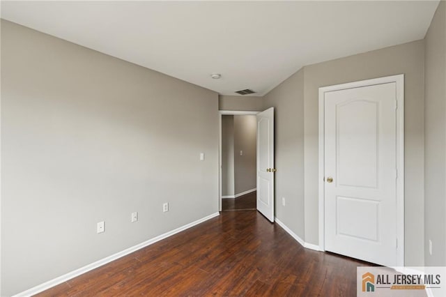 1115 Joseph Ct, South Plainfield, NJ 07080 - unfurnished bedroom with wood finished floors and baseboards