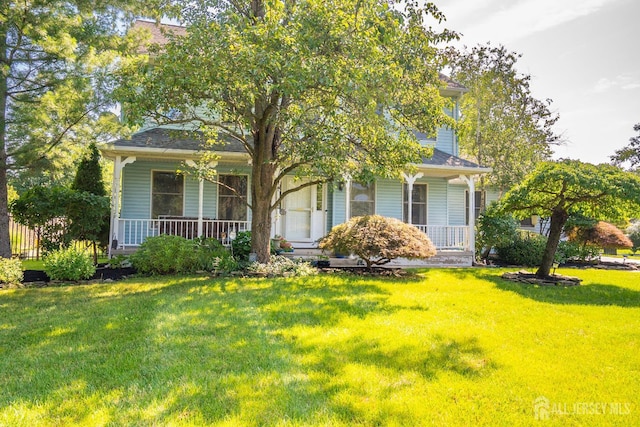 10 Chelsea Ct, South Brunswick, NJ 08810 - view of front of home with covered porch and a front yard