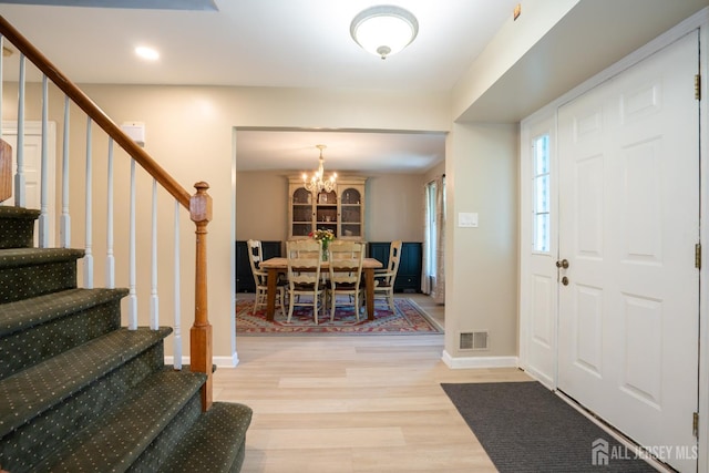 10 Chelsea Ct, South Brunswick, NJ 08810 - foyer entrance featuring stairway, light wood finished floors, a chandelier, and recessed lighting