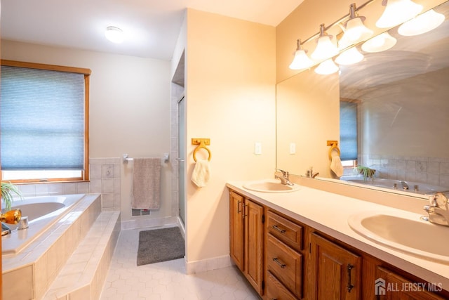 10 Chelsea Ct, South Brunswick, NJ 08810 - bathroom featuring a bath, double vanity, tile patterned flooring, and a shower stall