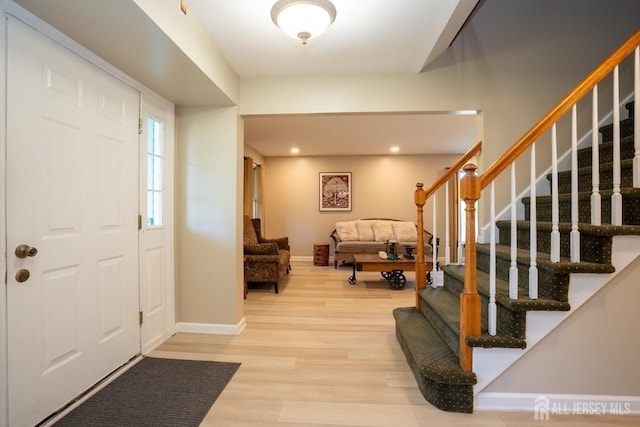 10 Chelsea Ct, South Brunswick, NJ 08810 - foyer entrance featuring wood finished floors and stairs