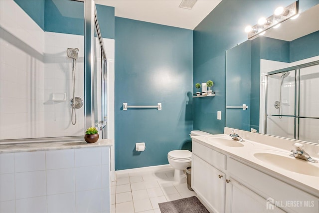 822 Dominick Ct, South Plainfield, NJ 07080 - full bath featuring tile patterned flooring, toilet, a stall shower, double vanity, and baseboards
