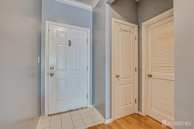 822 Dominick Ct, South Plainfield, NJ 07080 - foyer entrance with baseboards, crown molding, and light wood finished floors