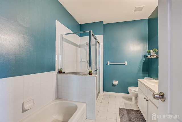 822 Dominick Ct, South Plainfield, NJ 07080 - full bathroom featuring a garden tub, a stall shower, toilet, vanity, and tile patterned flooring