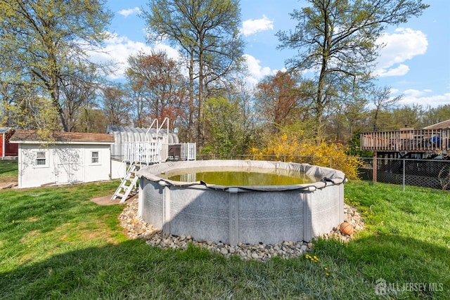 651 Myrtle Rd, North Brunswick, NJ 08902 - view of yard with an outdoor structure and a wooden deck