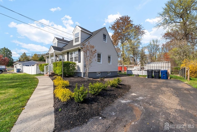 651 Myrtle Rd, North Brunswick, NJ 08902 - view of side of home featuring driveway