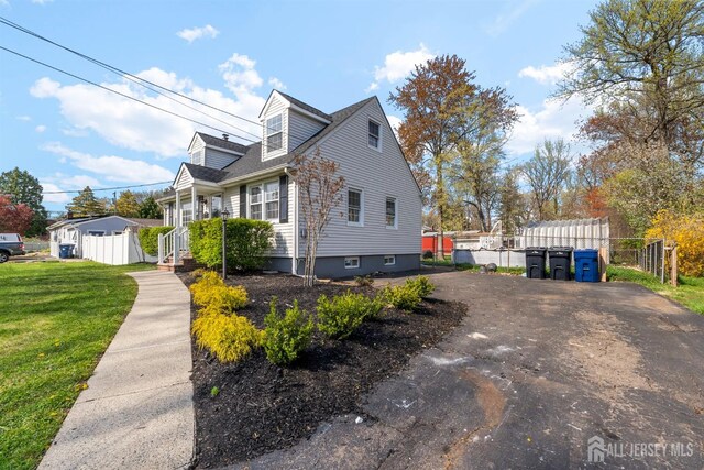 651 Myrtle Rd, North Brunswick, NJ 08902 - view of side of property featuring driveway
