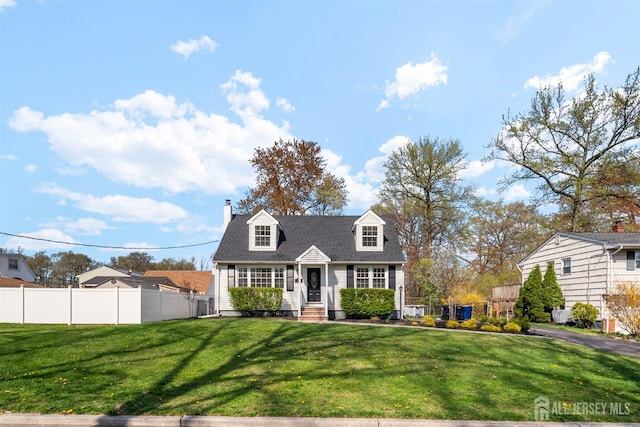 651 Myrtle Rd, North Brunswick, NJ 08902 - cape cod-style house featuring a chimney