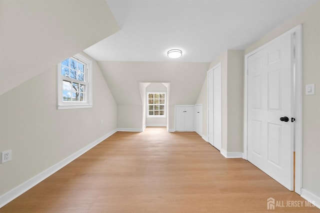 651 Myrtle Rd, North Brunswick, NJ 08902 - bonus room with light wood-style floors, baseboards, and lofted ceiling
