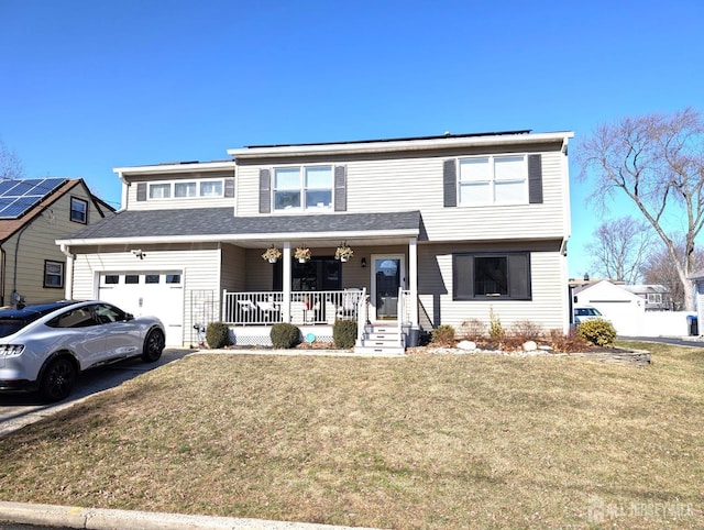 view of front facade featuring covered porch and a front lawn