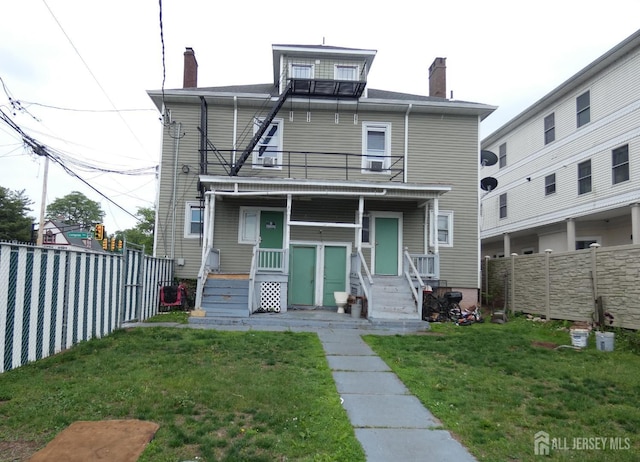 163 Livingston Ave, New Brunswick, NJ 08901 - view of front of home with a balcony and a chimney