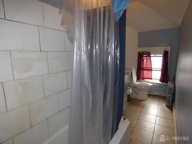 163 Livingston Ave, New Brunswick, NJ 08901 - full bathroom with toilet, shower / bath combo with shower curtain, and tile patterned flooring