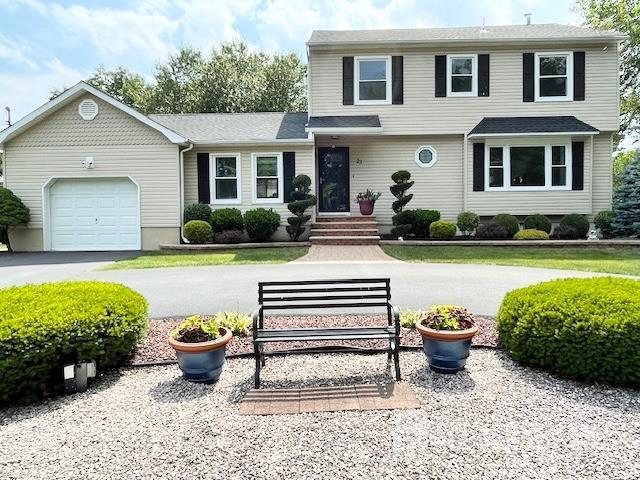 23 Prospect St, Old Bridge, NJ 08857 - view of front of house with a garage