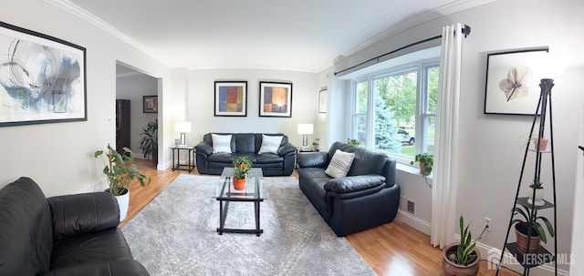 23 Prospect St, Old Bridge, NJ 08857 - living room with wood finished floors and crown molding