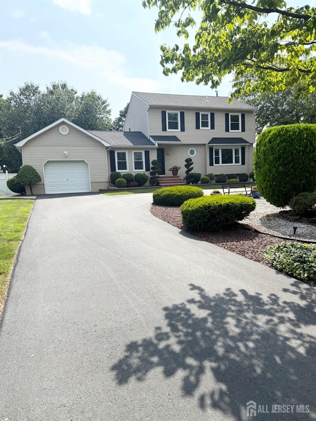 23 Prospect St, Old Bridge, NJ 08857 - view of front of property featuring a garage and driveway