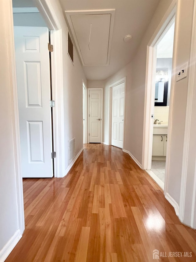 23 Prospect St, Old Bridge, NJ 08857 - hall with attic access and light wood-type flooring