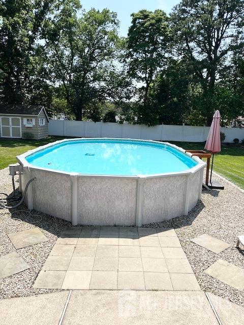 23 Prospect St, Old Bridge, NJ 08857 - view of pool with a storage shed
