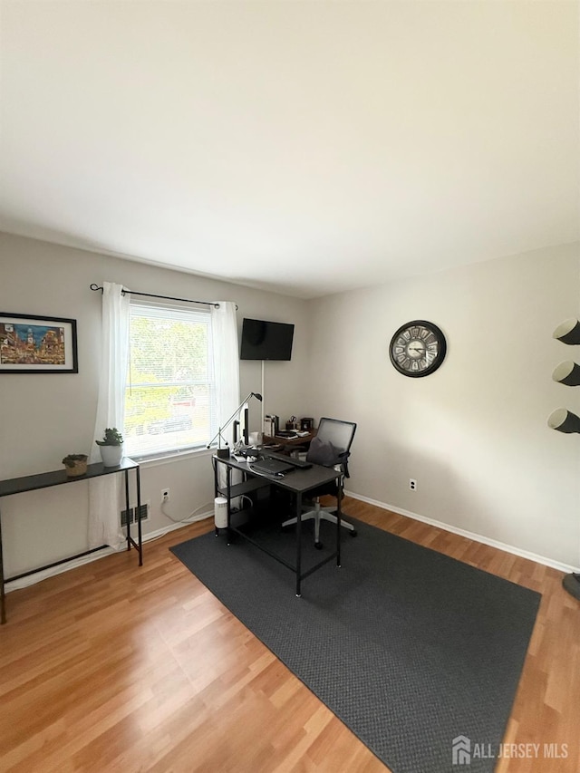 23 Prospect St, Old Bridge, NJ 08857 - dining space featuring a desk and wood finished floors