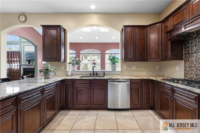 6 Monet Ct, South Brunswick, NJ 08852 - kitchen with appliances with stainless steel finishes, light tile patterned floors, light stone countertops, plenty of natural light, and recessed lighting