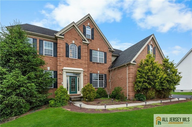 6 Monet Ct, South Brunswick, NJ 08852 - view of front of house featuring brick siding and a front lawn