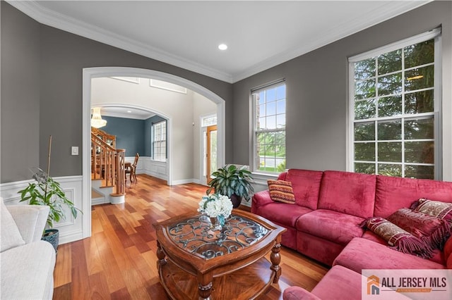 6 Monet Ct, South Brunswick, NJ 08852 - living room with wood finished floors, ornamental molding, stairway, arched walkways, and recessed lighting