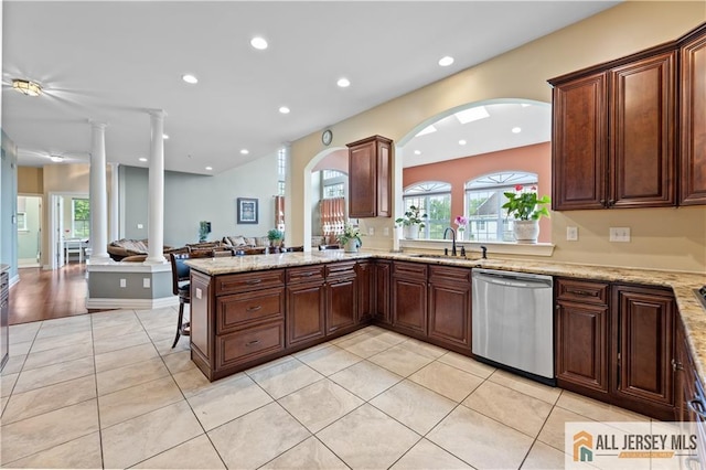 6 Monet Ct, South Brunswick, NJ 08852 - kitchen featuring dishwasher, ornate columns, light tile patterned floors, plenty of natural light, and recessed lighting