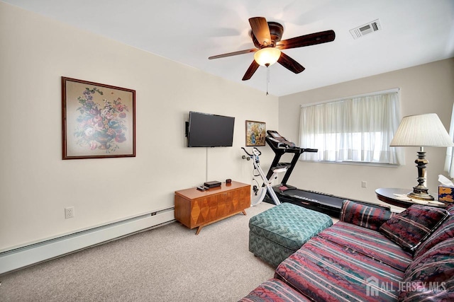 carpeted living area featuring a ceiling fan, visible vents, and baseboard heating