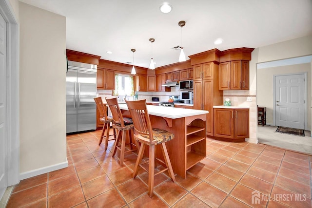 kitchen featuring open shelves, built in appliances, light countertops, recessed lighting, and under cabinet range hood