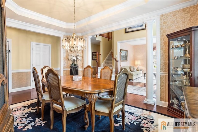 34 Schindler Ct Unit 17, Lawrence, NJ 08648 - dining area with decorative columns, wood finished floors, stairway, crown molding, and a chandelier