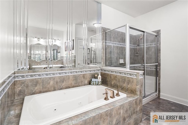 34 Schindler Ct Unit 17, Lawrence, NJ 08648 - full bathroom featuring a jetted tub, a shower stall, and baseboards