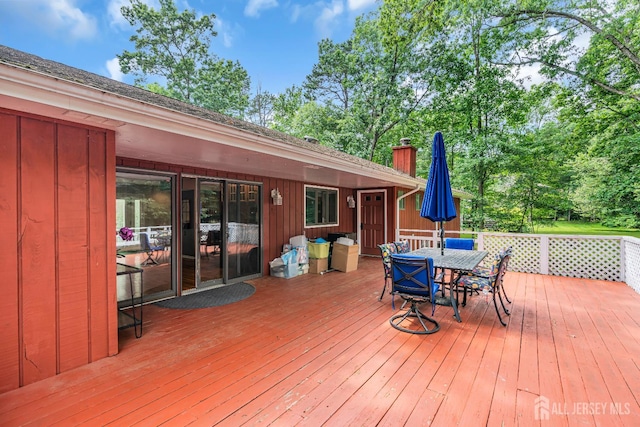 2 Crommelin Ct, East Brunswick, NJ 08816 - wooden deck featuring outdoor dining space