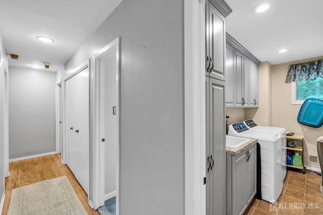 2 Crommelin Ct, East Brunswick, NJ 08816 - laundry area with cabinet space, recessed lighting, and separate washer and dryer