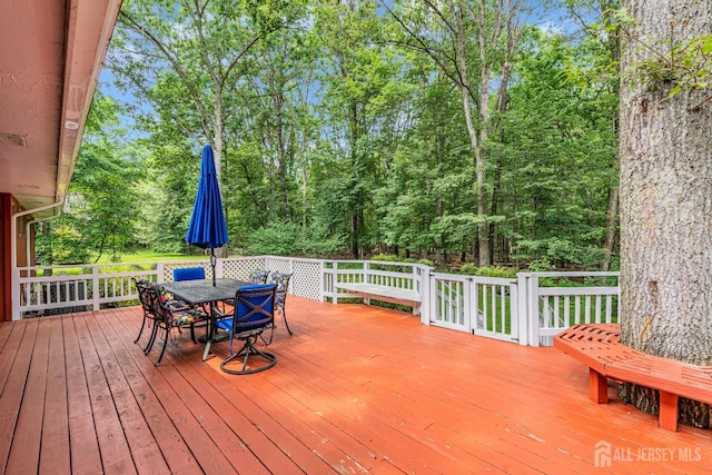 2 Crommelin Ct, East Brunswick, NJ 08816 - wooden deck featuring outdoor dining space