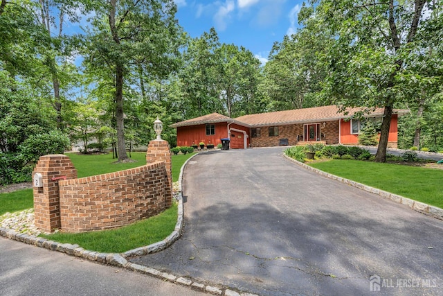2 Crommelin Ct, East Brunswick, NJ 08816 - ranch-style home featuring a garage, a front yard, and driveway