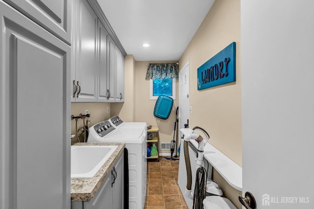 2 Crommelin Ct, East Brunswick, NJ 08816 - washroom with cabinet space, separate washer and dryer, recessed lighting, and dark tile patterned flooring