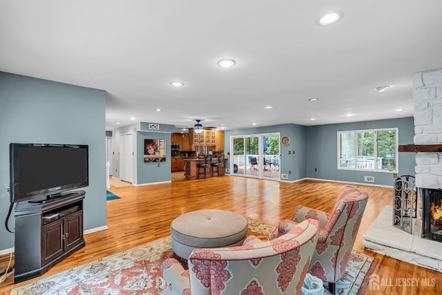 2 Crommelin Ct, East Brunswick, NJ 08816 - living room with a fireplace, light wood finished floors, ceiling fan, and recessed lighting