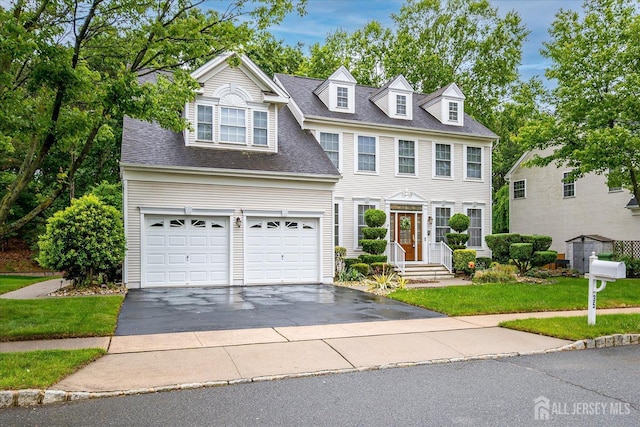 35 Fabiszewski Way, Parlin, NJ 08859 - view of front of home featuring driveway, a front lawn, and roof with shingles