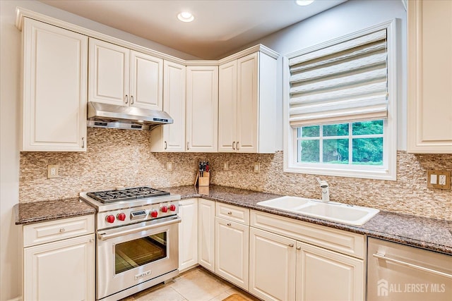 35 Fabiszewski Way, Parlin, NJ 08859 - kitchen featuring stainless steel appliances, under cabinet range hood, a sink, backsplash, and light tile patterned floors