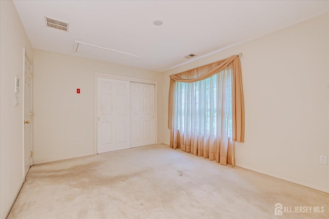 35 Fabiszewski Way, Parlin, NJ 08859 - unfurnished bedroom featuring attic access, carpet flooring, a closet, and baseboards