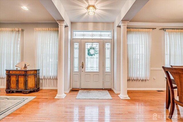 35 Fabiszewski Way, Parlin, NJ 08859 - entrance foyer featuring ornate columns, baseboards, hardwood / wood-style flooring, recessed lighting, and crown molding